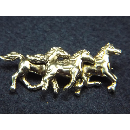 64 - 925 silver three horse brooch