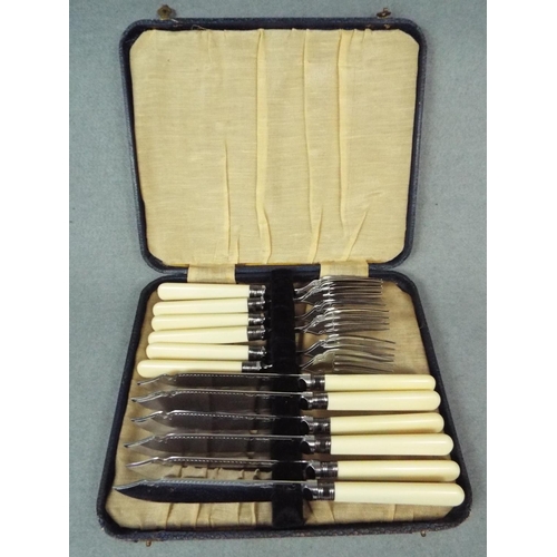 70 - Set of silver collared fish servers with original box.