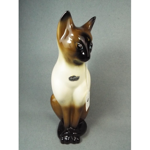 9 - Large Trentham Pottery Siamese cat, 14 inches tall with original sticker