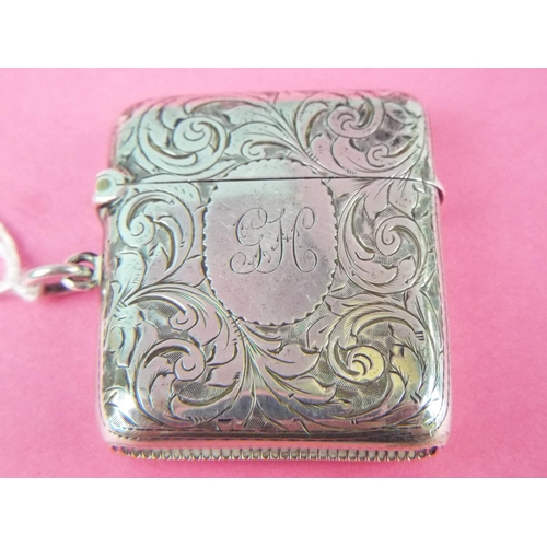 195 - Silver Vesta with scrolled decoration. Lemon gilt interior. Hallmarked for Birmingham 1898. Excellen... 