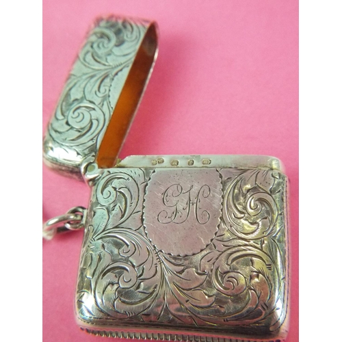 195 - Silver Vesta with scrolled decoration. Lemon gilt interior. Hallmarked for Birmingham 1898. Excellen... 