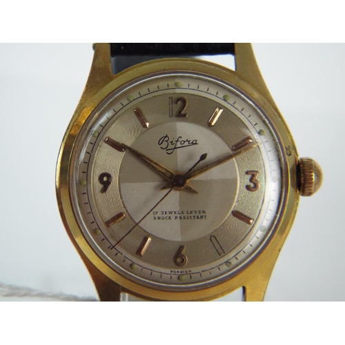 99 - Swiss, 17 jewel Bifora mechanical watch in working order. Leather strap.