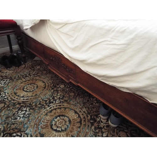 268 - Edwardian era bed. Hand carved head board and foot board.