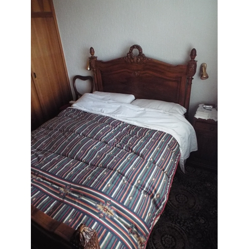 268 - Edwardian era bed. Hand carved head board and foot board.