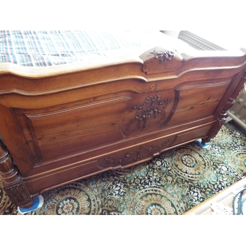 268 - Edwardian era bed. Hand carved head board and foot board.