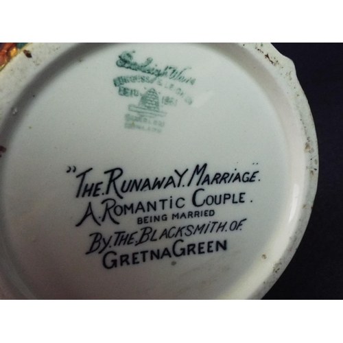 11 - Burleighware Runaway Marriage, Gretna Green Jug.  8.5 inches tall. Excellent.