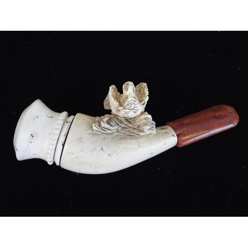 116 - Victorian  Meerschaum carved pipe with leather case depicting a bird .