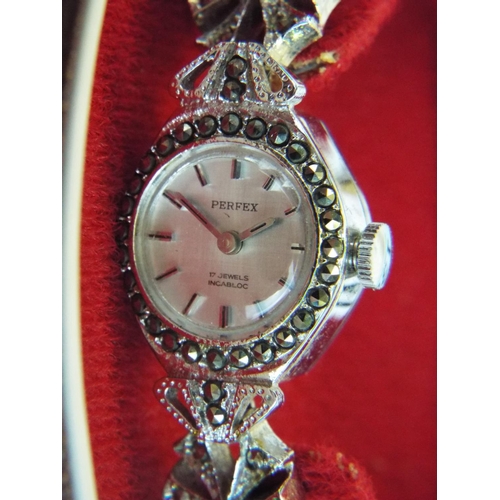 135 - Ladies perfex 17 jewel marcasite watch with original case & safety chain