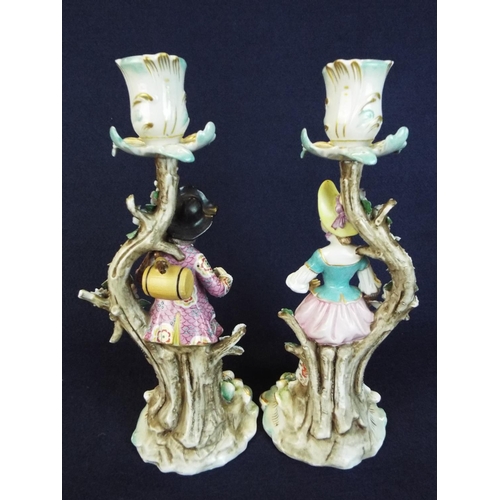 15 - Pair of Dresden Figural candlesticks of a pastoral couple. Marked for Sitzendorf 1880/1901, 10 inche... 