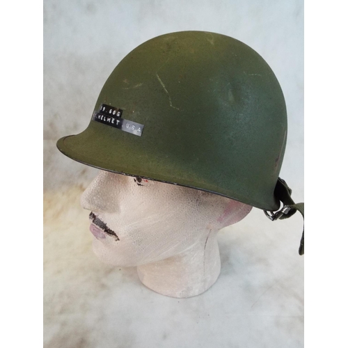 119 - American Kevlar lined metal battle helmet.