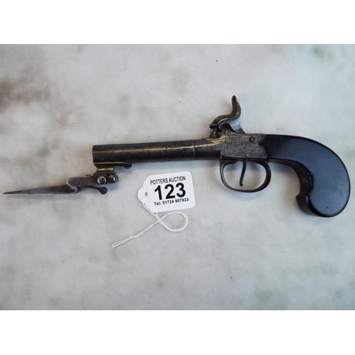 123 - Early to mid Victorian percussion pistol with spring mounted bayonet.