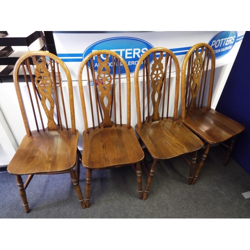 821 - Four Old Charm wheelback chairs. Excellent