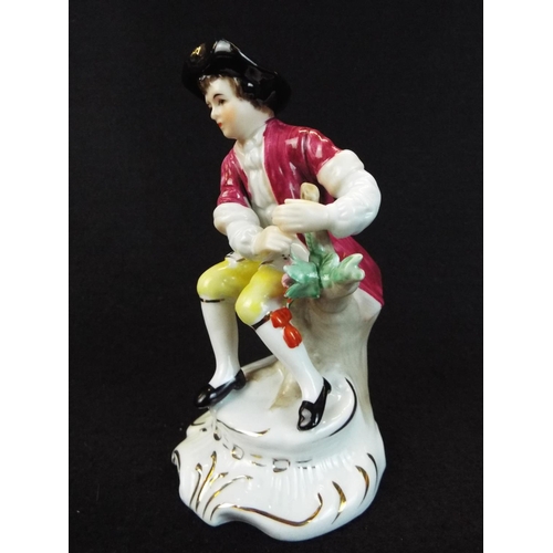 3 - Sitzendorf, Dresden porcelain figure of a seated boy. Excellent .