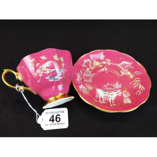 46 - Pretty Royal Albert cabinet cup and saucer in Chinese pattern with pink background