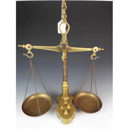 16 - Large set of Brass scales with full set of weights. No makers mark apparent. 22 inches tall.