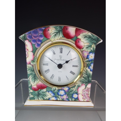 17 - Royal Doulton quartz clock in the Orchard Hill pattern. 5 inches tall.