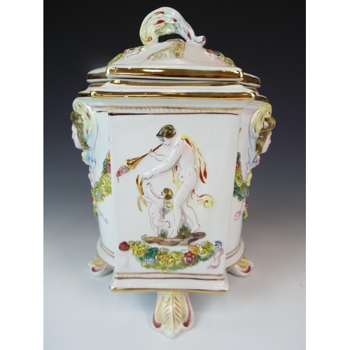 3 - Lovley lidded Capo Di Monte Caddy or Jar. 9.5 Inches tall stands on four leaf feet decoratied with c... 