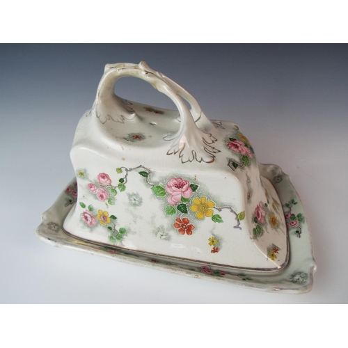 39 - Pretty Continental porcelain butter or cheese dish . Decorated with transfer printed flowers.  9 inc... 