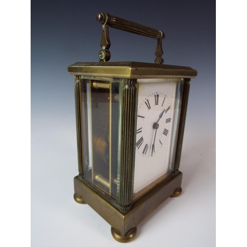 46 - Vintage carriage clock. Possibly French made, Working order with glass sides and top. 6.5 inches tal... 