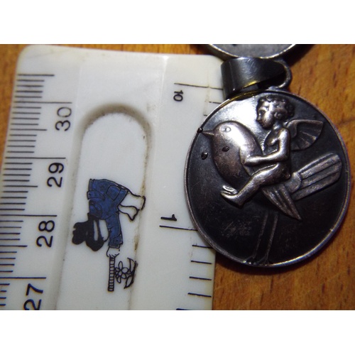 118 - Interesting small double pendant featuring a winged fairy riding a Robin. Makers marks to one leaf o... 