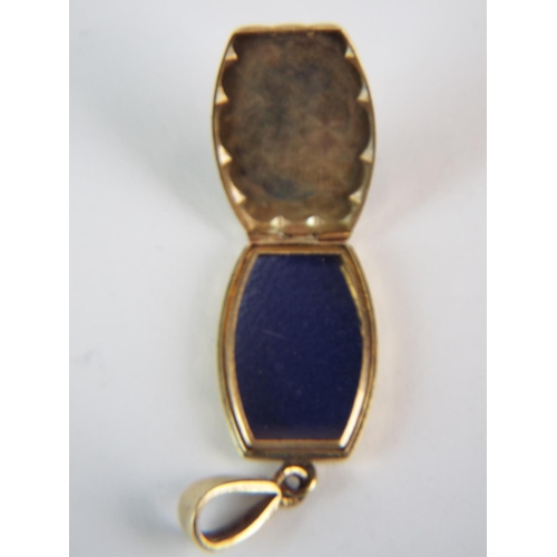 113 - 9ct Gold Locket. 1 inch long. 3.5g