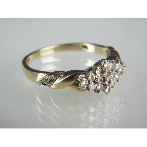 131 - 9ct Gold Multi Diamond Cluster ring, Diamonds to shoulders. Finger size 'R5 -S'    2.8g