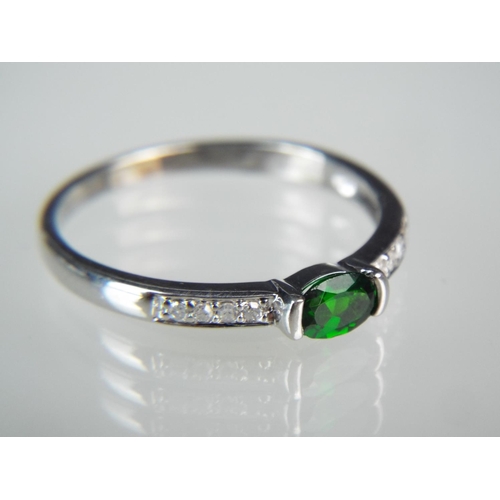 157 - 9ct White Gold, Green Quartz &  Diamond set ring. Finger size 'R5-S' 2g.