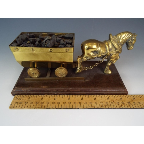 86 - Smaller brass coal mining model. 9 inches long.