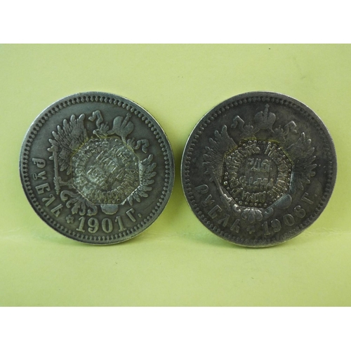 211 - Two reproductionImperial pre revolution Russian coins overstamped from 1917.
THESE COINS ARE THOUGHT... 