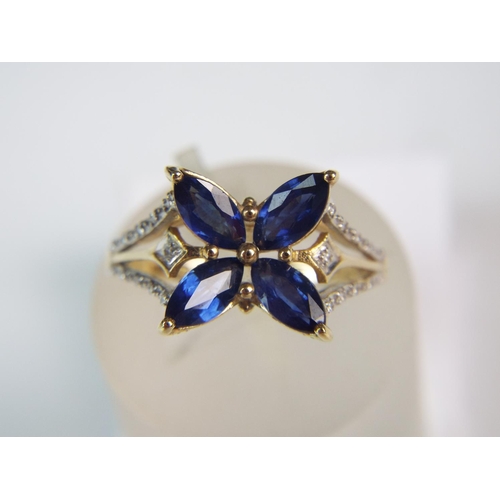 243 - 9ct Gold ring set with Burmese Sapphires plus Diamonds to shoulders. 4cts of Sapphires. Finger size ... 