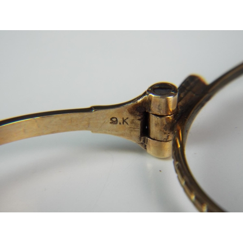 302 - Early 20th Century spring loaded hand held pair of spectacles all made from 9ct gold with milled edg... 