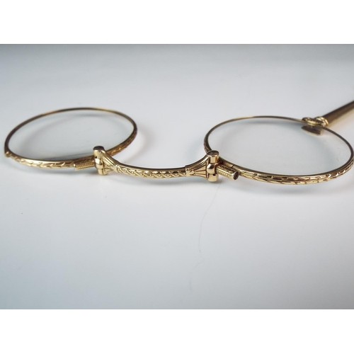 302 - Early 20th Century spring loaded hand held pair of spectacles all made from 9ct gold with milled edg... 