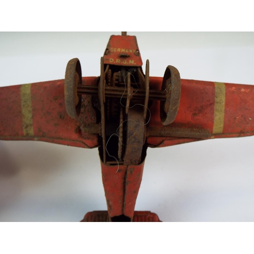 333 - Very old and interesting German tinplate clockwork aircraft by DRGM.   6 inch wingspan. For restorat... 