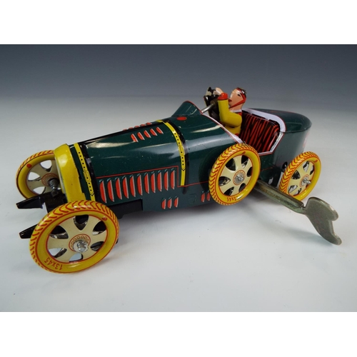 337 - Chinese made Tinplate clockwork Bugatti  T- 35 Race car with original box. Working order.