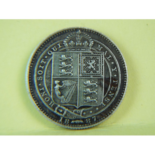 212 - 1887 Victorian Silver Shilling. Crowned quarted shield of arms to obvers. 925 silver, fair condition... 