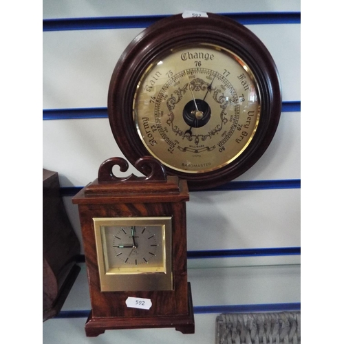 592 - Darkwood Baromaster circular wall mounted barometer plus a quartz mantle clock with heavy solid wood... 