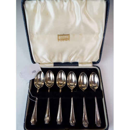 600 - Six solid silver teaspoons each Hallmarked London 1940 by Harrods of London. Original silk and velve... 