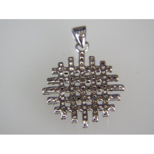 131A - African Blue Diamond pendant set on a 925 silver, round portcullis setting.  0.05pts of Diamonds wit... 