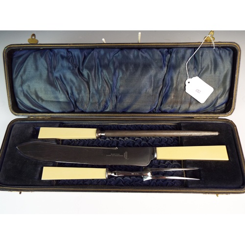 602 - Stainless steel carving set by Baxter, Bury st Edmonds. Original velvet lined box. 1940's era