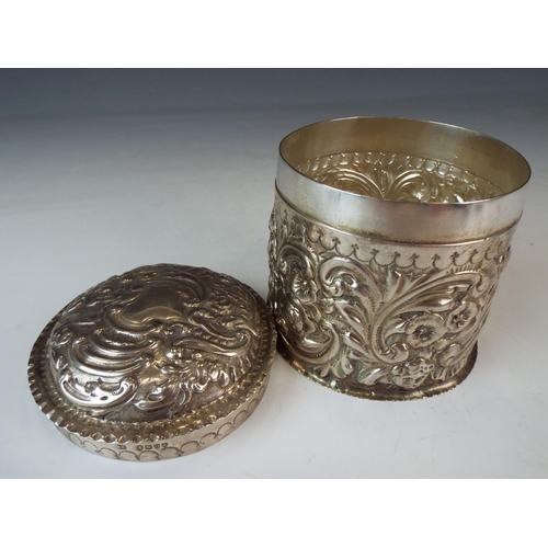 220 - Beautifully Decorated Silver tea caddy with matching close fitting lid. London 1889.  William Cripps... 