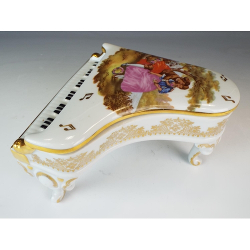 345 - Pretty Limoge trinket box as a grand pianon. 6 inches long and wide.