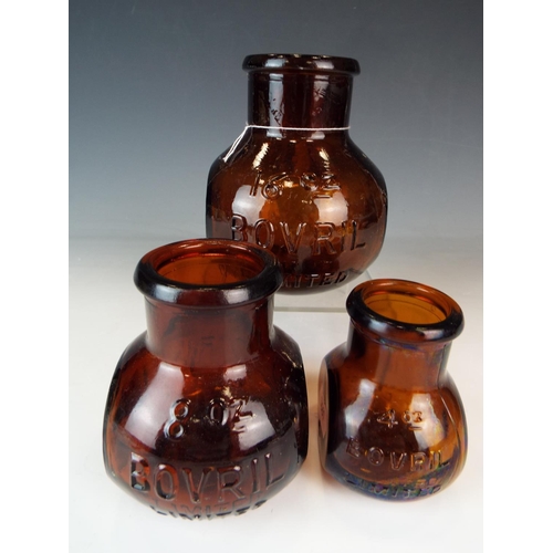 354 - Three graduated Amberglass Bovril kitchen jars TOC era.  English made by Forsters glass.