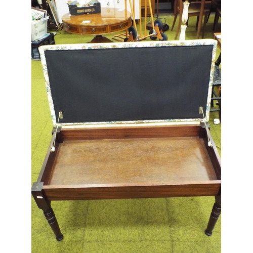 590 - Duet piano stool with hinged top with needlepoint upholstered decoration.   H:21 X W:36 inches.
