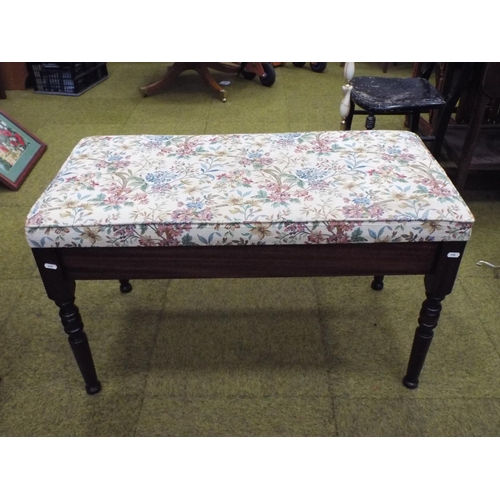 590 - Duet piano stool with hinged top with needlepoint upholstered decoration.   H:21 X W:36 inches.