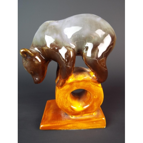 61 - Russian Konakovo balancing Bear figurine. Makers mark to base. 5.5 inches tall.