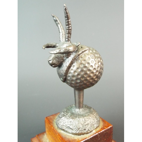 11 - Unusual bronze golf trophy as a Hebridean ram,  raised on a stepped wooden plinth.  5 inches tall in... 