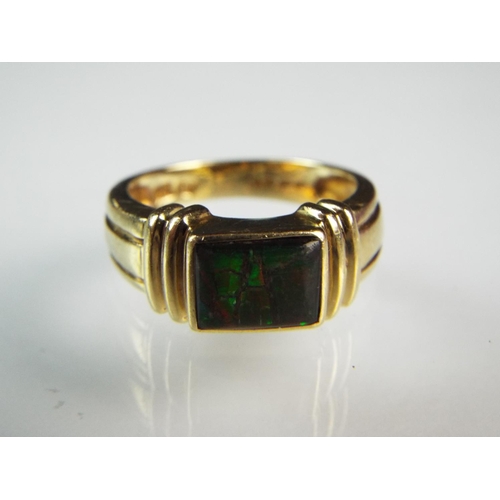 114 - 14ct Yellow gold Deco style Green stone set ring.  Finger size 'N5'  3.8g