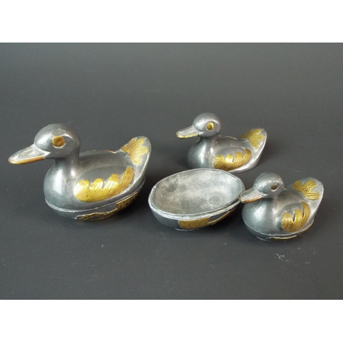 14 - Three interesting small pill boxes as lead ducks set with brass decorations.  Largest being 2.5 inch... 