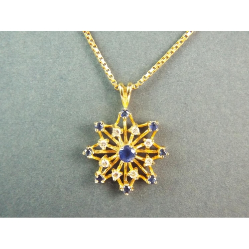 164 - Stunning 18ct Yellow gold pendant set with Diamonds and Sapphires in a star pattern. Set on a 20 inc... 