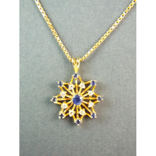 164 - Stunning 18ct Yellow gold pendant set with Diamonds and Sapphires in a star pattern. Set on a 20 inc... 